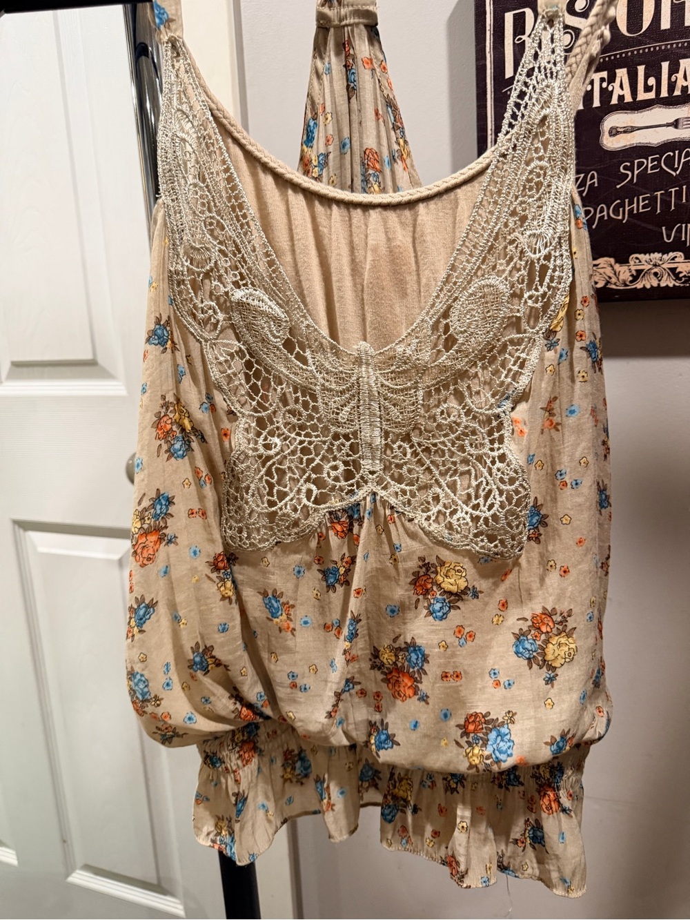 mine... Beige Sleeveless Top with Blue and Orange Floral Accents